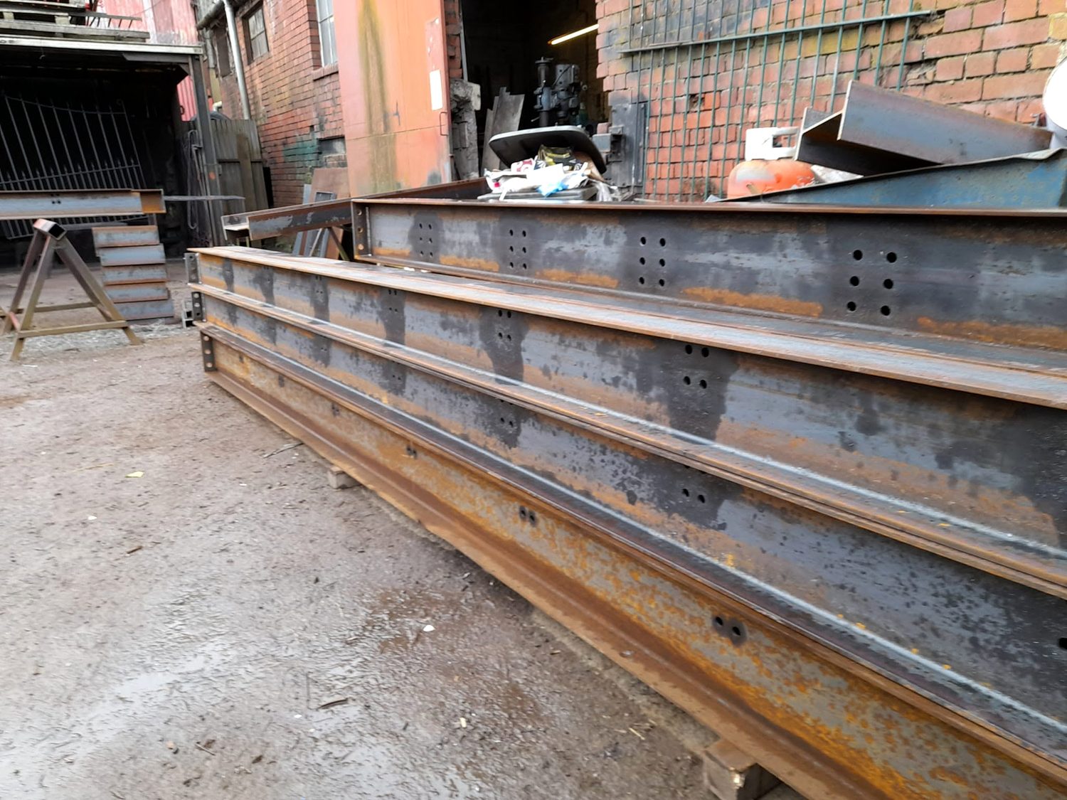 Structural steel beams drilled and prepped in the Lloyds Fabrications yard in Newport